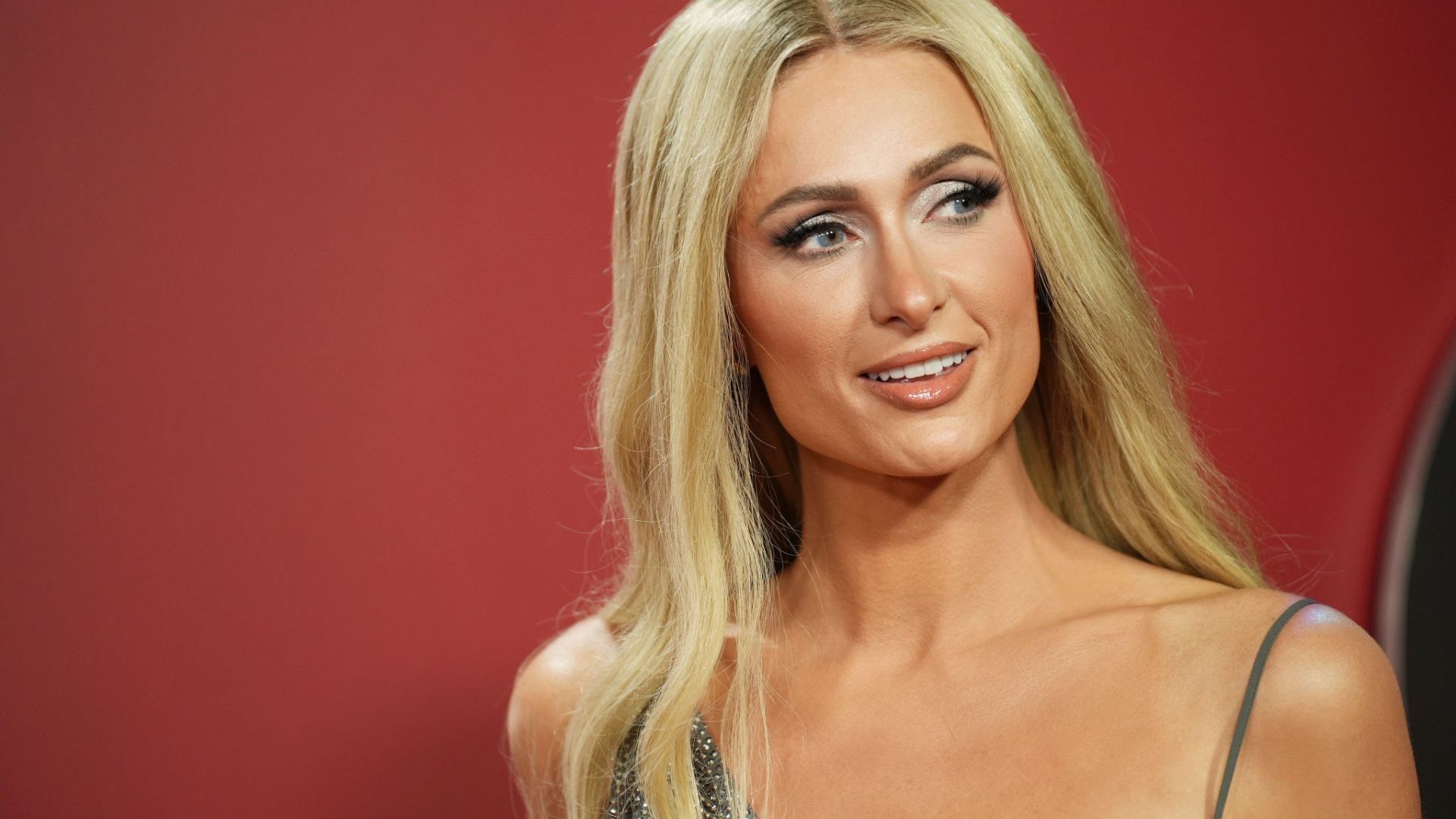 Paris Hilton: Unveiling the Woman Behind the Glamour
